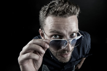 fashionable bearded man in glasses