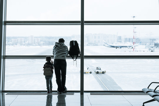 Passengers silhouette in the modern airport