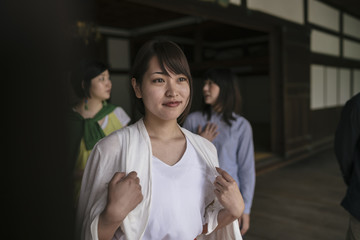 Group of japanese tourists using a tablet