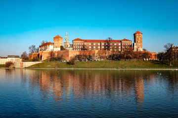 Fototapeta na wymiar Famous landmark Wawel castle seen from Vistula, Krakow, Poland.