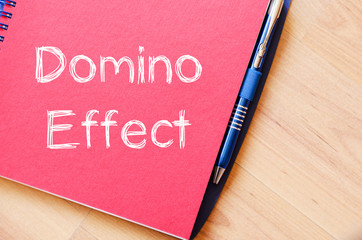 Domino effect concept on notebook