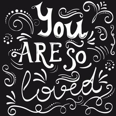 Typography poster with inscription You are so loved. Hand drawn lettering phrase on chalkboard.