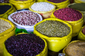Sacks Of Healthy Legumes And Grains on vietnamese street market. Beans, peas and lentils in big bags.
