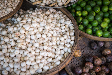 Garlic on a street market in Vietnam, Asia. Colorful ilustration of dry products and fruits on a market.