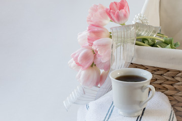 coffee cup with pink tulips.