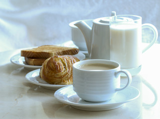 coffee and bread for breakfast.