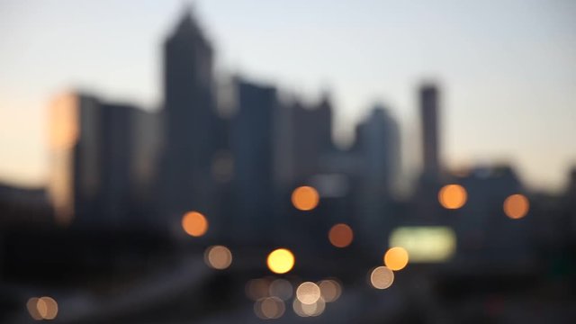 Modern cityscape with skyscrapers and highway at night, Atlanta,Georgia, USA. Blurred bokeh city background