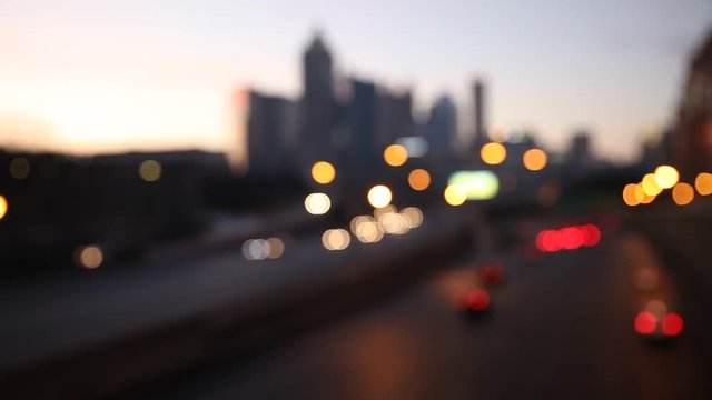 Modern cityscape with skyscrapers and highway at night, Atlanta,Georgia, USA. Blurred bokeh city background