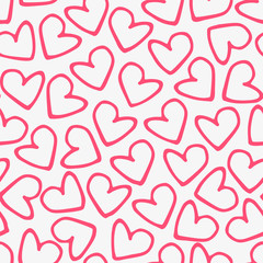 Hand drawn seamless pattern with hearts in pink on cream background.