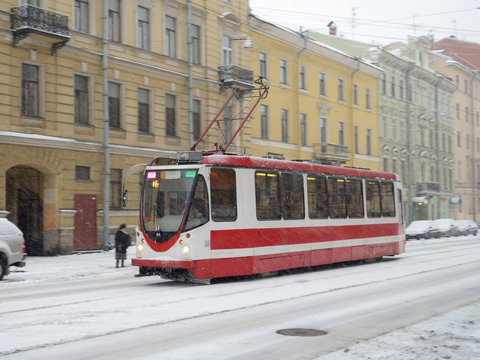 The tram is at the stop.