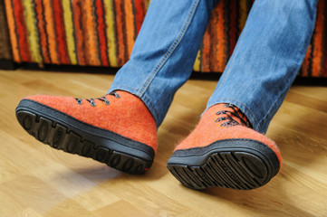 Orange felt shoes.