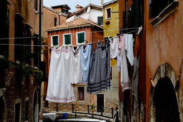Fototapeta na wymiar Clothesline with laundry in the streets of Venice, Italy.