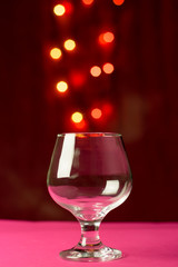 Wine glass with a light bokeh in the background