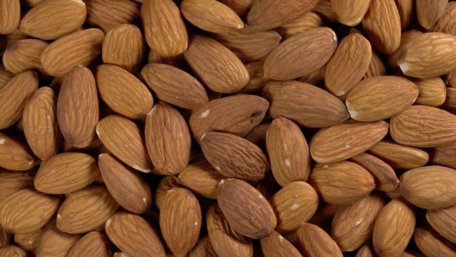 rotating background of almonds