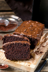 Moist chocolate cake with milk chocolate topping glaze