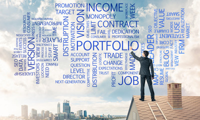 Young businessman standing on house roof and writing leadership 
