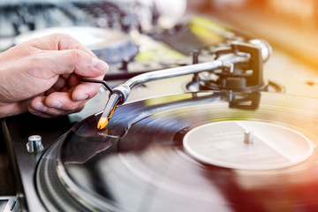 Dj mixes the track in club