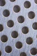 Industrial background metal sheet with holes