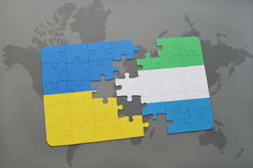 puzzle with the national flag of ukraine and sierra leone on a world map