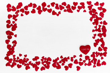 Valentines Day background with red hearts. Copy space, top view.
