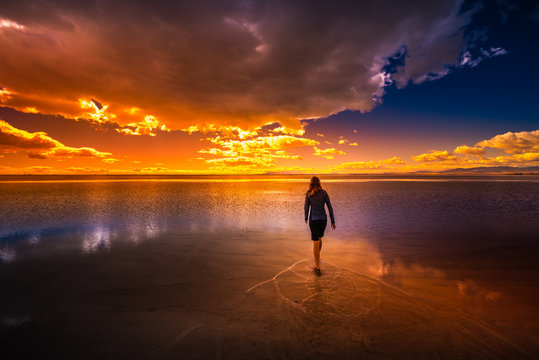 Bonneville Salt Flats Utah Girl Walking In Shallow Water