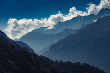 Clouds over mountain ridge in the Himalayas,Nepal