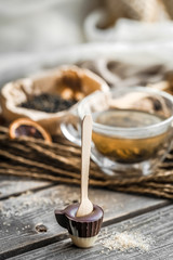 tea and chocolate candy on a stick