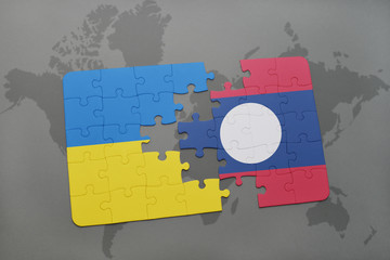 puzzle with the national flag of ukraine and laos on a world map