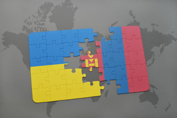 puzzle with the national flag of ukraine and mongolia on a world map