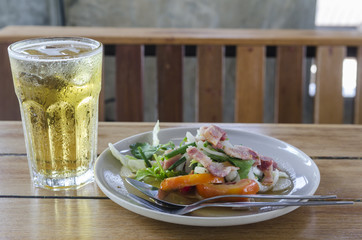 Thai food salad with beer