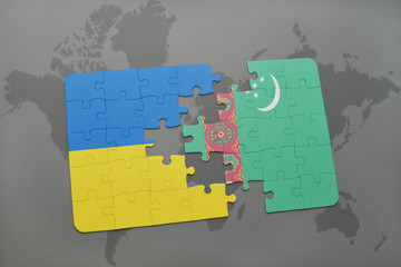 puzzle with the national flag of ukraine and turkmenistan on a world map
