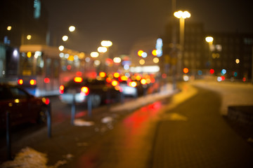 Fototapeta na wymiar Night road in the city, cars light in traffic jams, defocused,