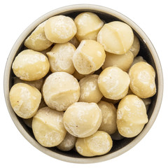 macadamia nuts in isolated bowl