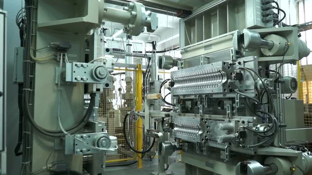 Factory. machines for pressing silicone insulators of high-voltage electric transmission lines