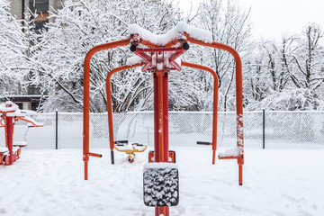 Outdoor workout gym with training gear in winter