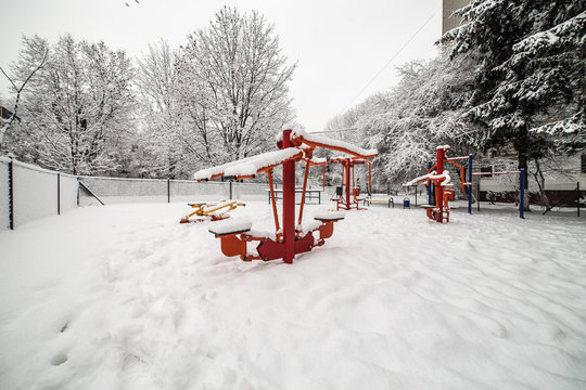 Outdoor workout gym with training gear in winter