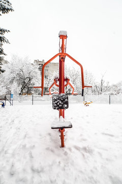 Outdoor workout gym with training gear in winter