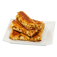Russian Stuffed Pancakes Blintzes with Meat Isolated on White. Selective focus.