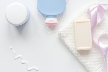 baby organic cosmetic for bath on white bakground top view
