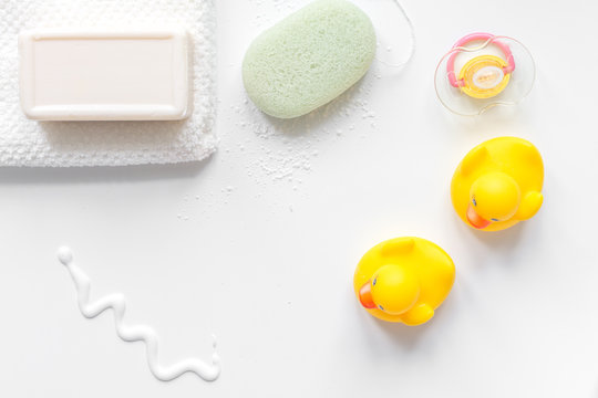 Baby Accessories For Bath With Duck On White Background