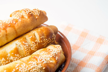 Sesame covered pastry in a bowl