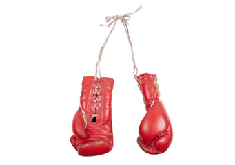 old used and battered red leather boxing gloves, isolated on white background