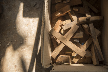 Desk of a carpenter tools. Studio shot on a wooden background.