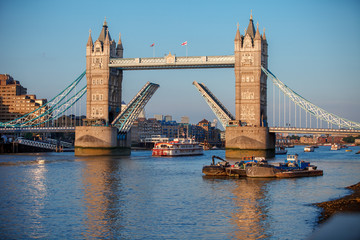 Tower Bridge raised to let ship pass through. London