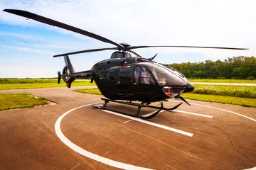 Zelfklevend Fotobehang Zwarte helikopter © malexeum