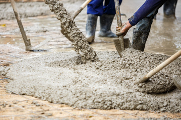 plasterer concrete worker at floor construction