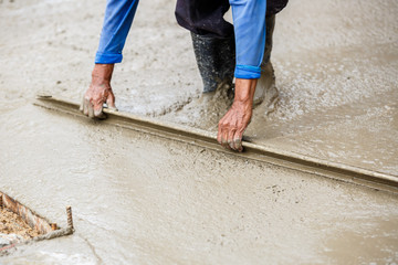 plasterer concrete worker at floor construction