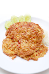 Omelet served with jasmine rice in white dish isolated on white background