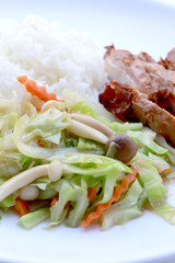 stir fried vegetables and Grilled chicken breasts with thai jasmine rice in white dish isolated on white background. Thai style Food.