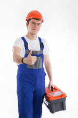 Builder smiling and raised his finger up on a white background